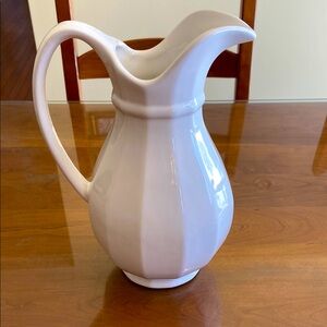 Heritage Water Pitcher by Pfaltzgraff . 10 1/2 inch height and 3 5/8 inch base.